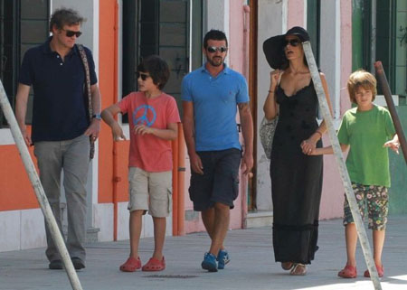 Colin First with his sons Luca and Mateo and wife Livia.